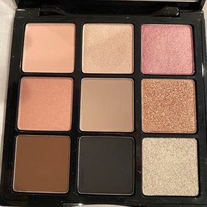 Trish McEvoy 9 piece eyeshadow pallet.Color names on back.Brand new/Never used